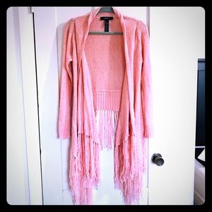 Pink cardigan sweater with dramatic fringe